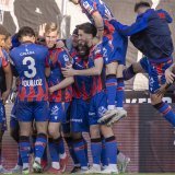La joie des joueurs bâlois après le 2-0 KEYSTONE/GEORGIOS KEFALAS